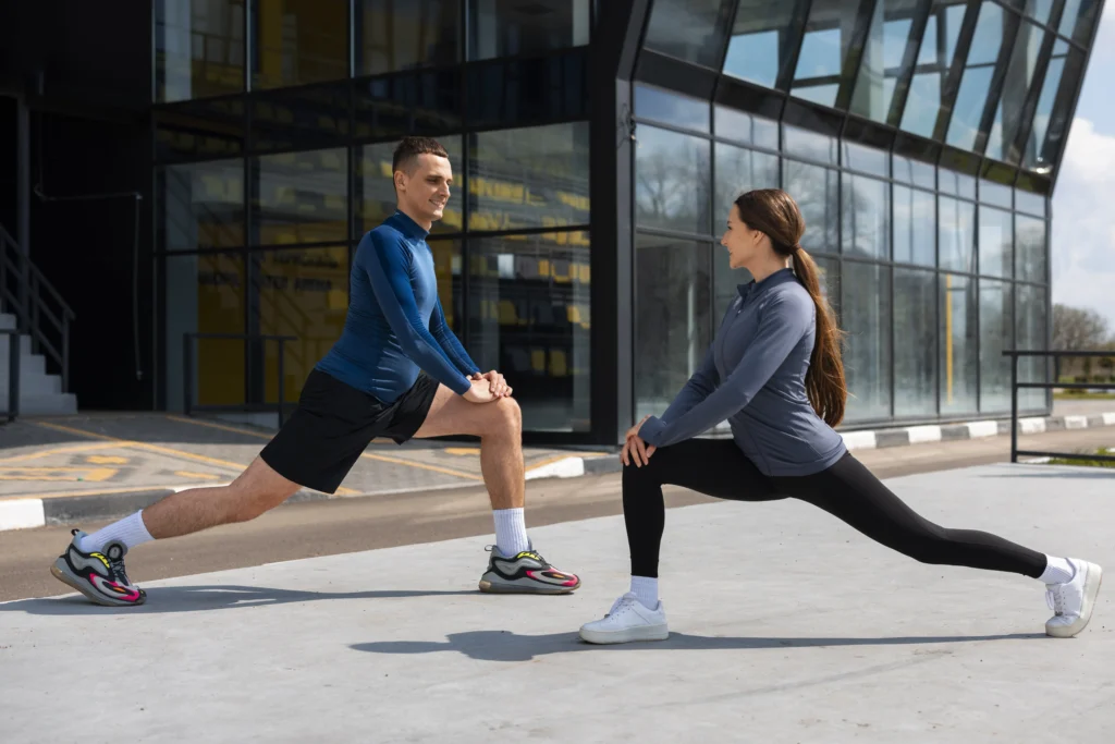 Men and Woman doing a warmup running exercise